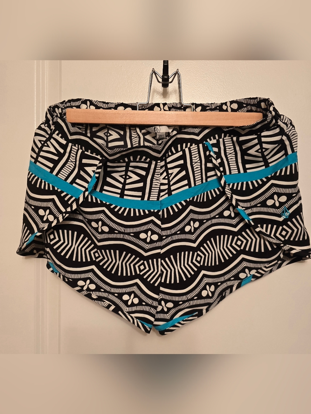 Women’s Black & White Geometric Volcom Shorts with Light Bkue Trim. Size M/12